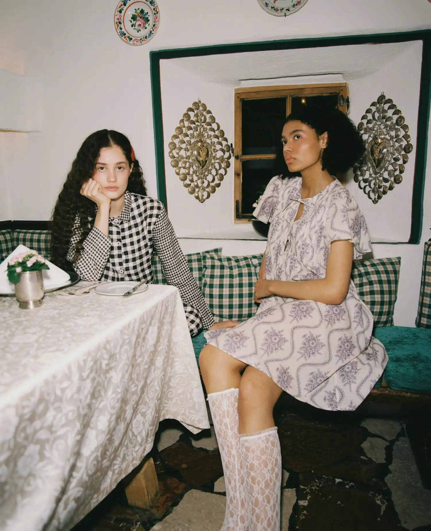 two women sitting at a table